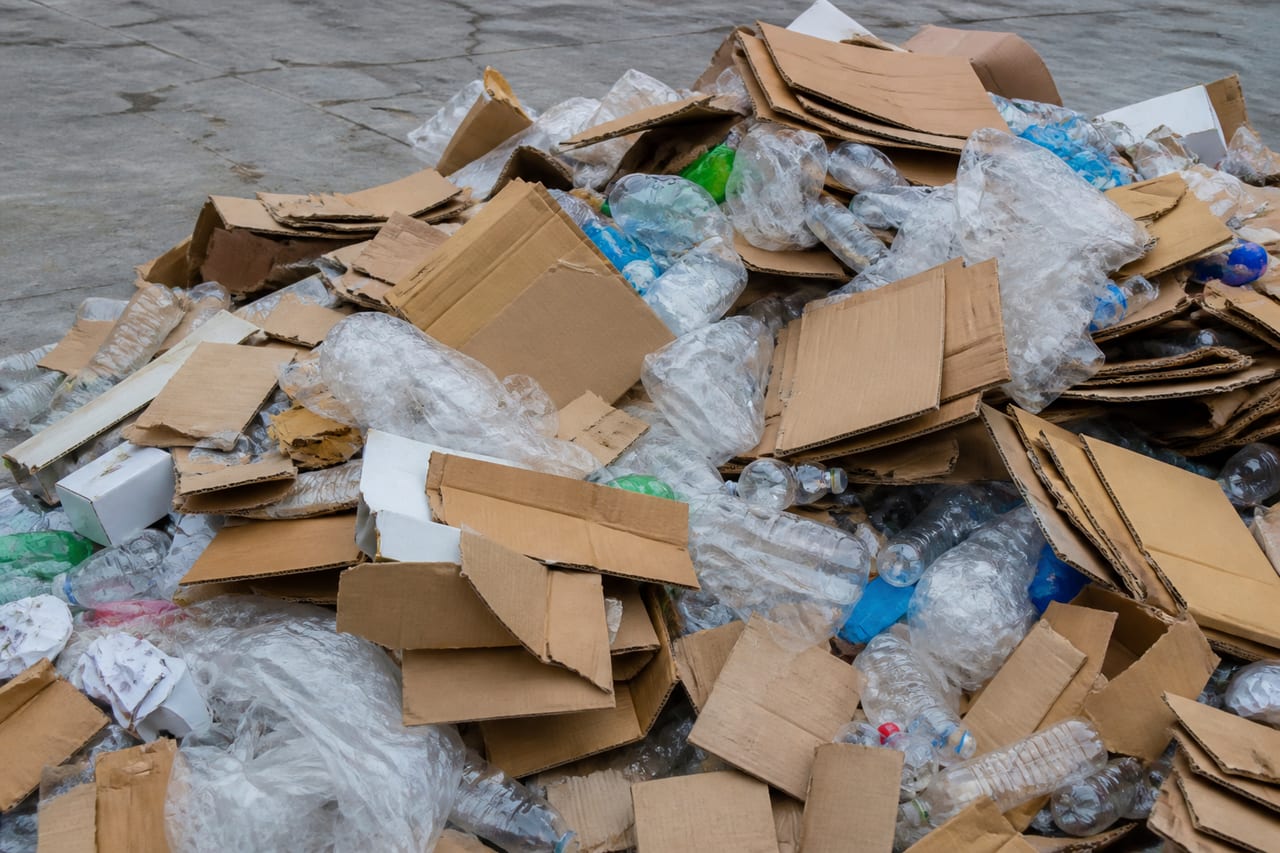 Mixed cardboard, plastic film and packaging waste